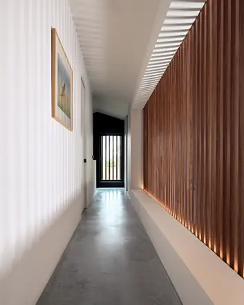 Modern interieur van een hal met betonnen vloer, houten wandpanelen en een schilderij aan de muur